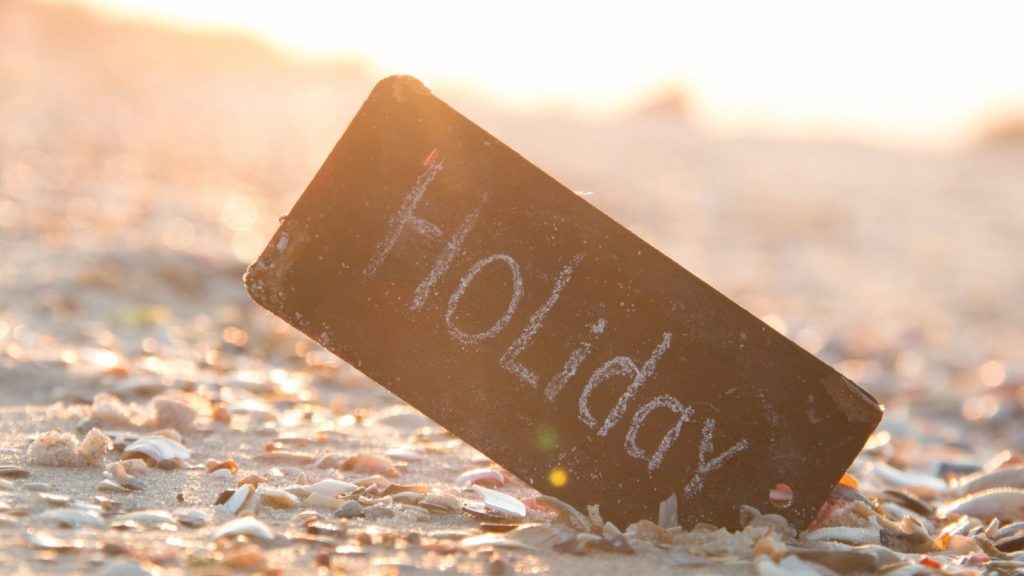 holiday card in sand